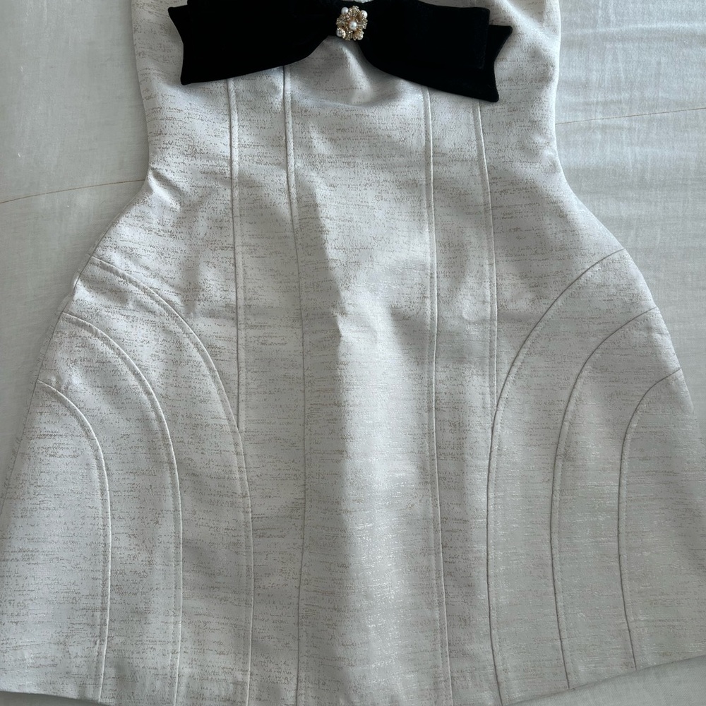 Elegant White Mini Dress with Black Bow